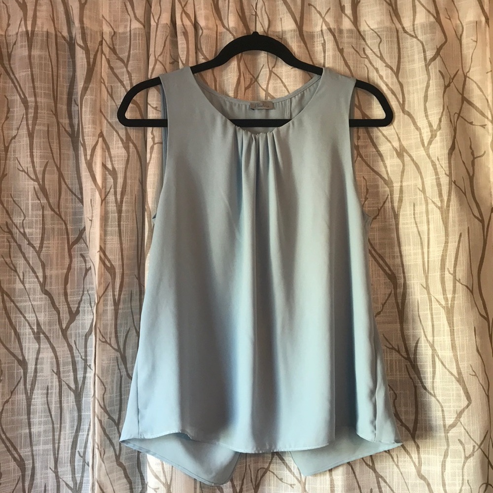 Blue sleeveless blouse